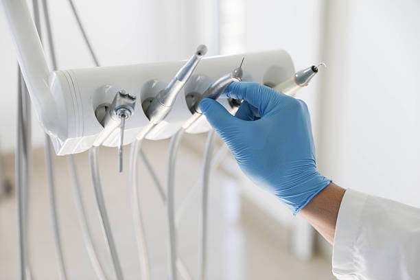 Professional Tooth Extraction technician working in Caddo, OK